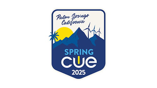 Spring CUE 2025 logo featuring Palm Springs, mountains, and wind turbines.